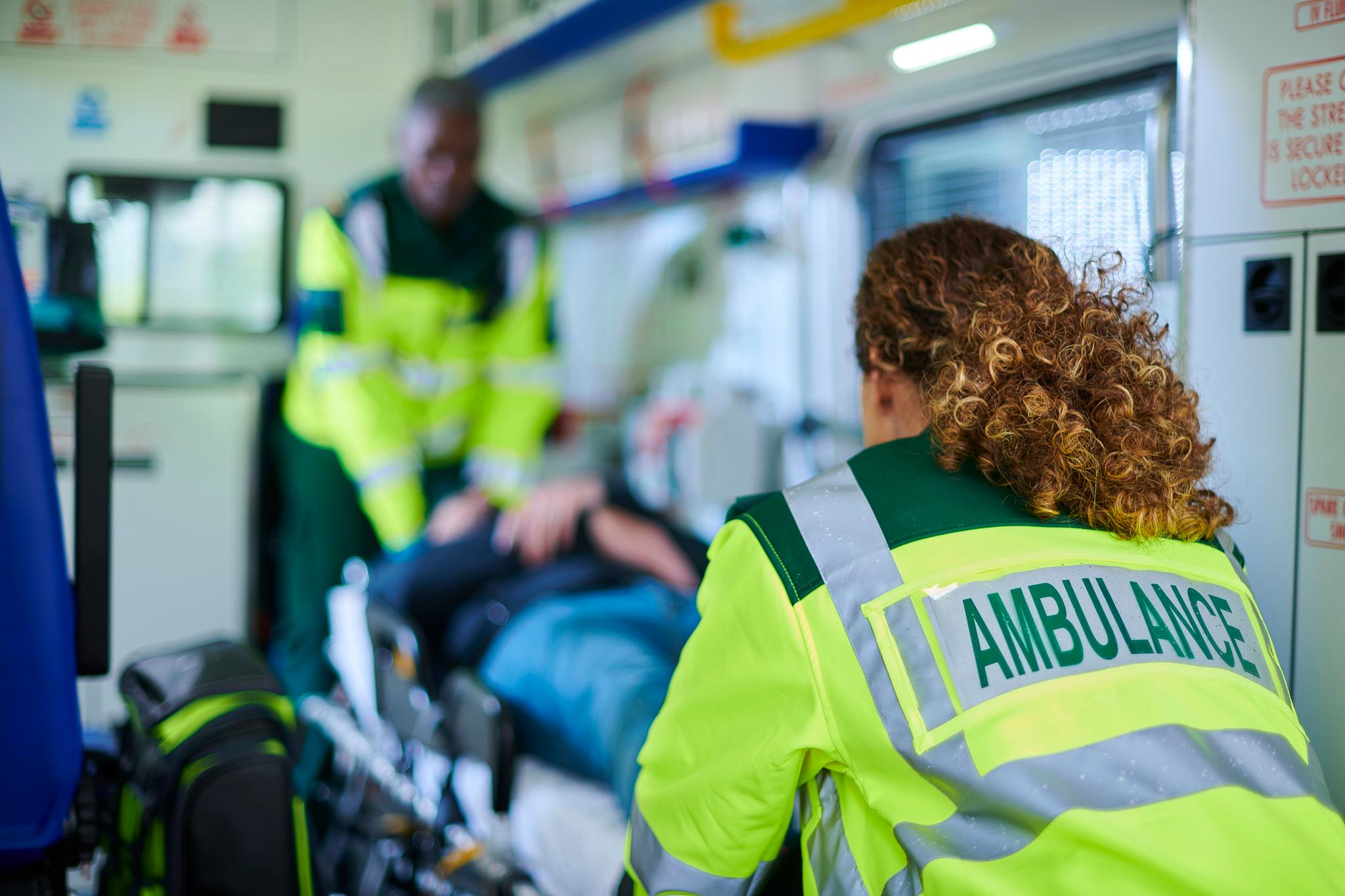 emergency medical services team in an ambulance truck