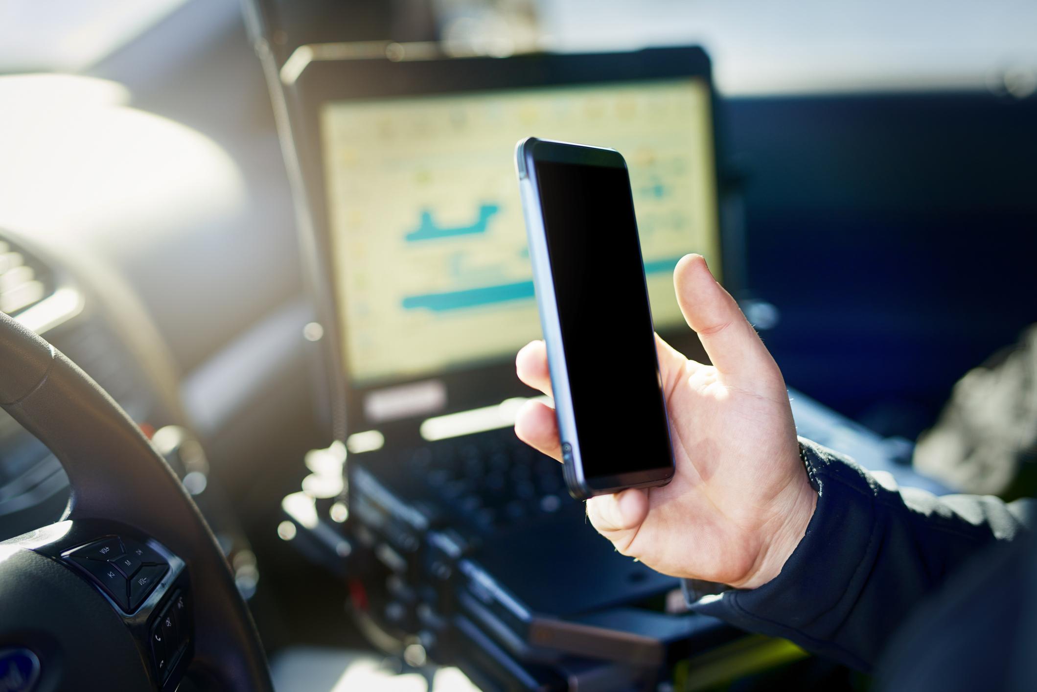 police officer using mobile technology
