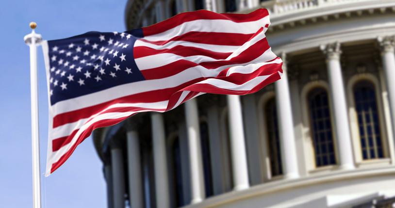 U.s. capitol building and american flag