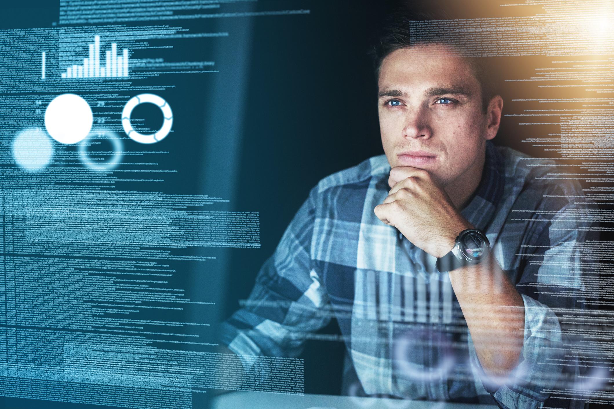 Man looking at analytics and data for local government operations