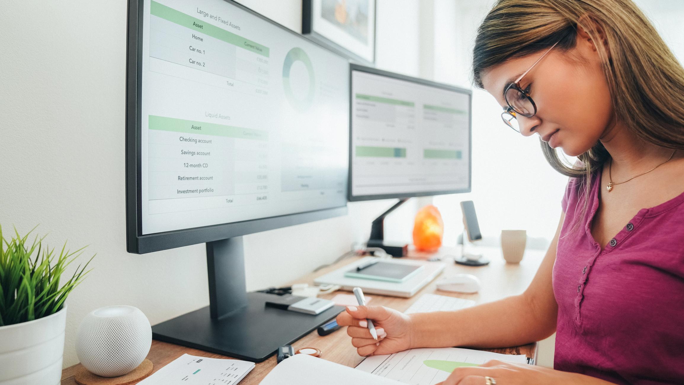 woman reviewing utility billing and collections data