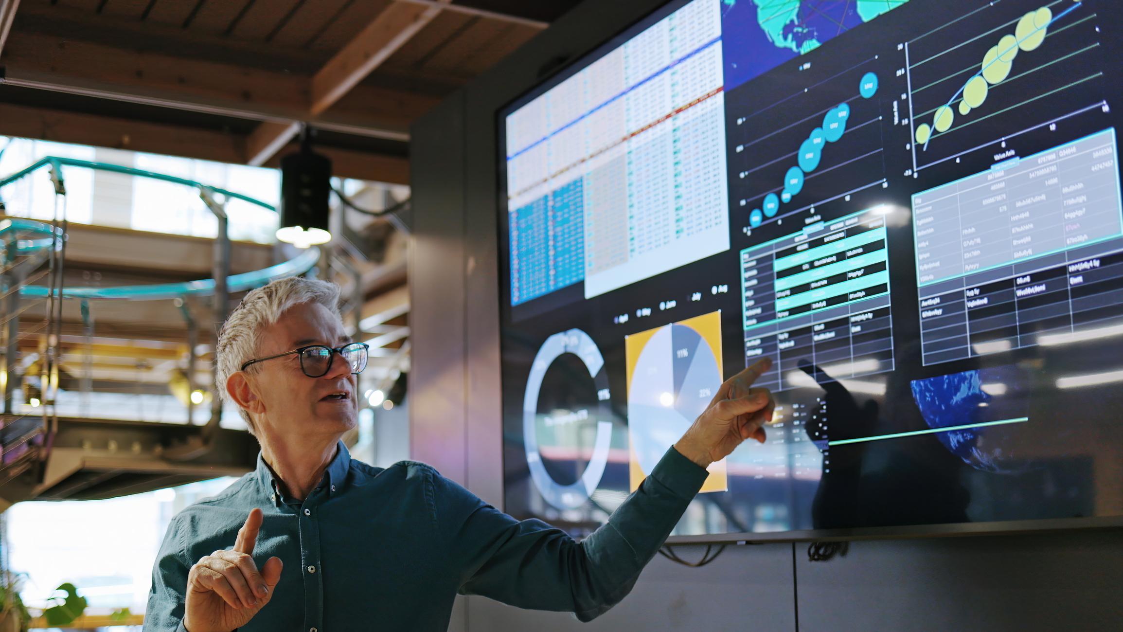 city manager looking at data analytics